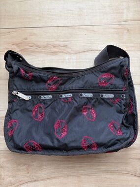 LeSportsac Black Crossbody Bag with Red Lip Print
